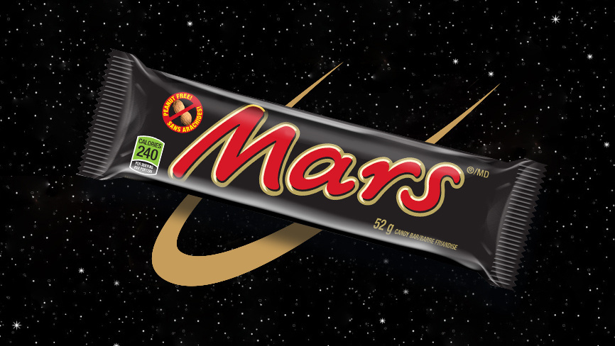 Mars bar on black background with gold swoop
