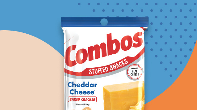 Bag of Cheddar Cheese Baked Cracker Combos on a blue and orange patterned background