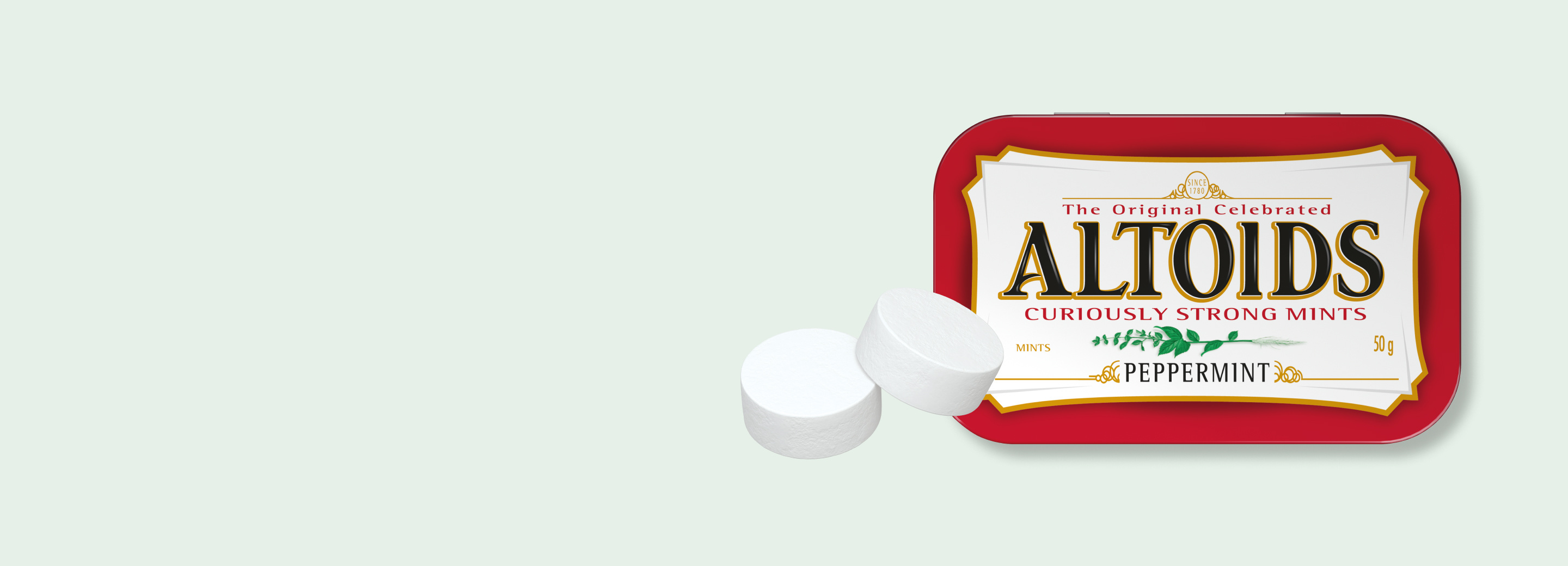 Tin of Peppermint Altoids and two Altoids mints on a white background