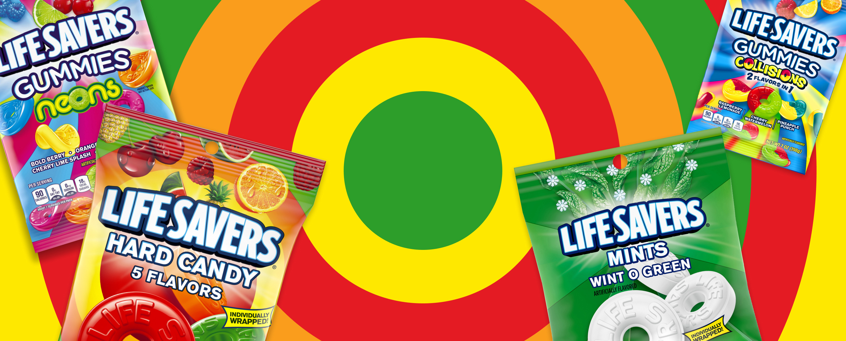 Four packages of various LIfe Savers candies in front of colored circular background
