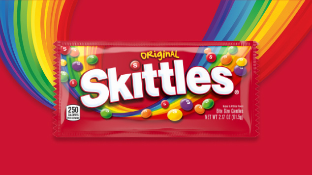 Skittles original chewy single bag with red and rainbow background