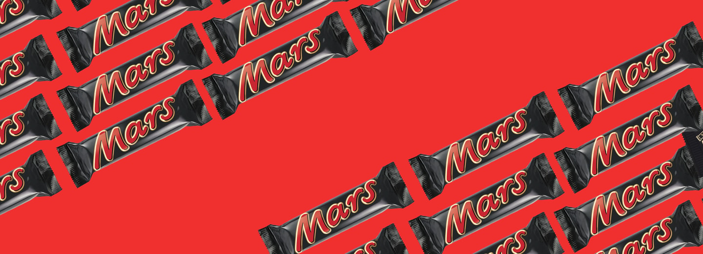 Pattern of packaged Mars bars on top of red background