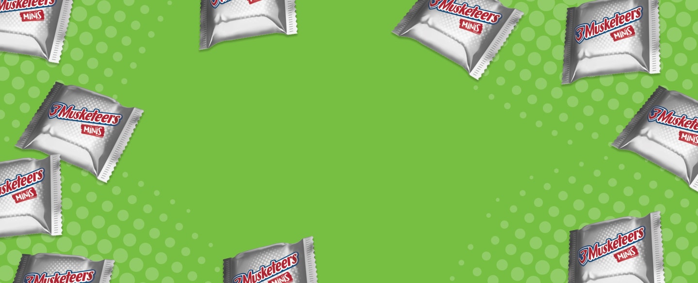 Packaged mini 3 Musketeers bars across patterned green background