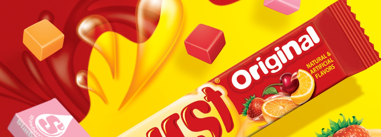 Close up shot of Starburst Original Chews in a stick, in the background there are unwrapped starburst chews and juicy bursts illustrated on top of a red and yellow background